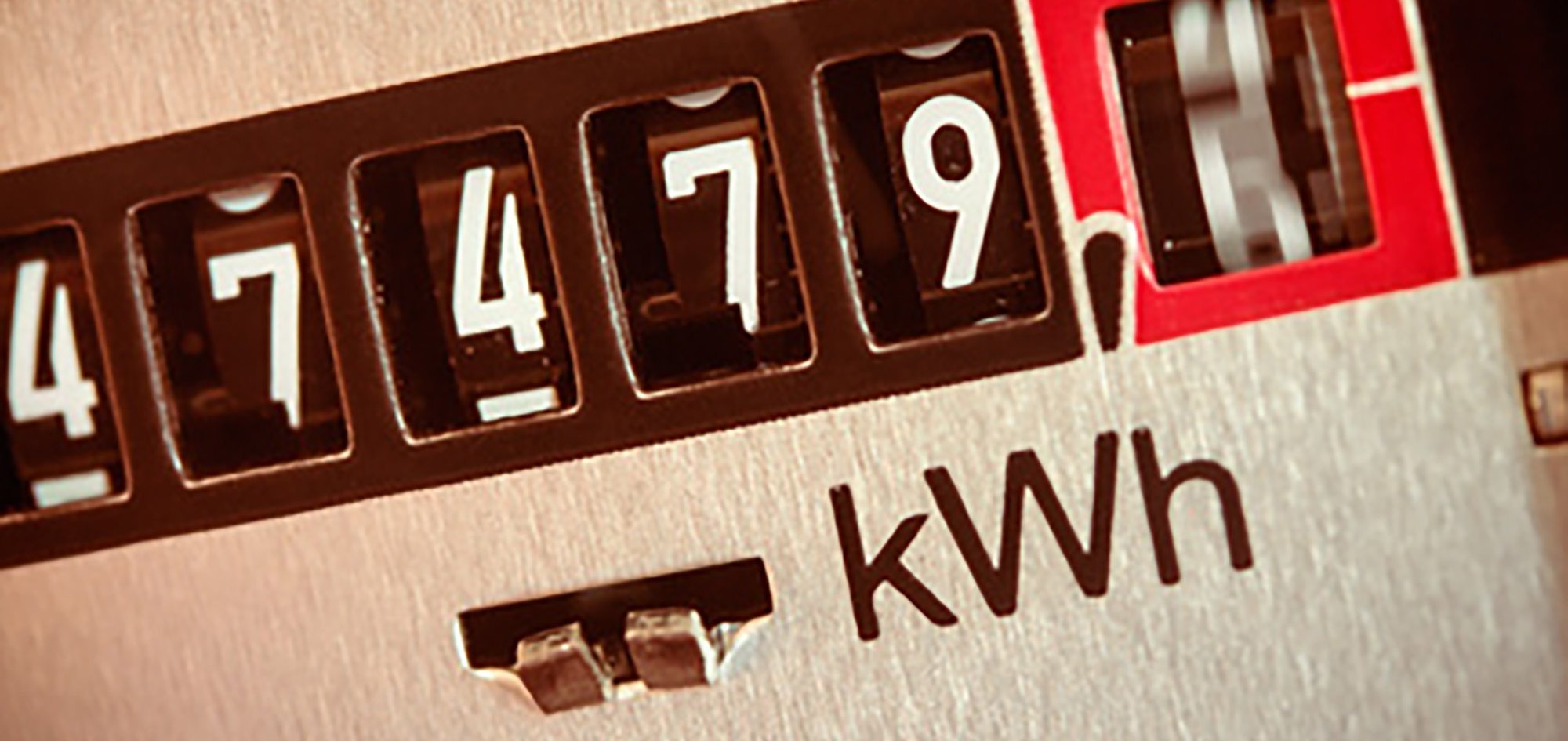 Energiezähler mit kWh-Angabe und sich bewegender letzter Ziffer